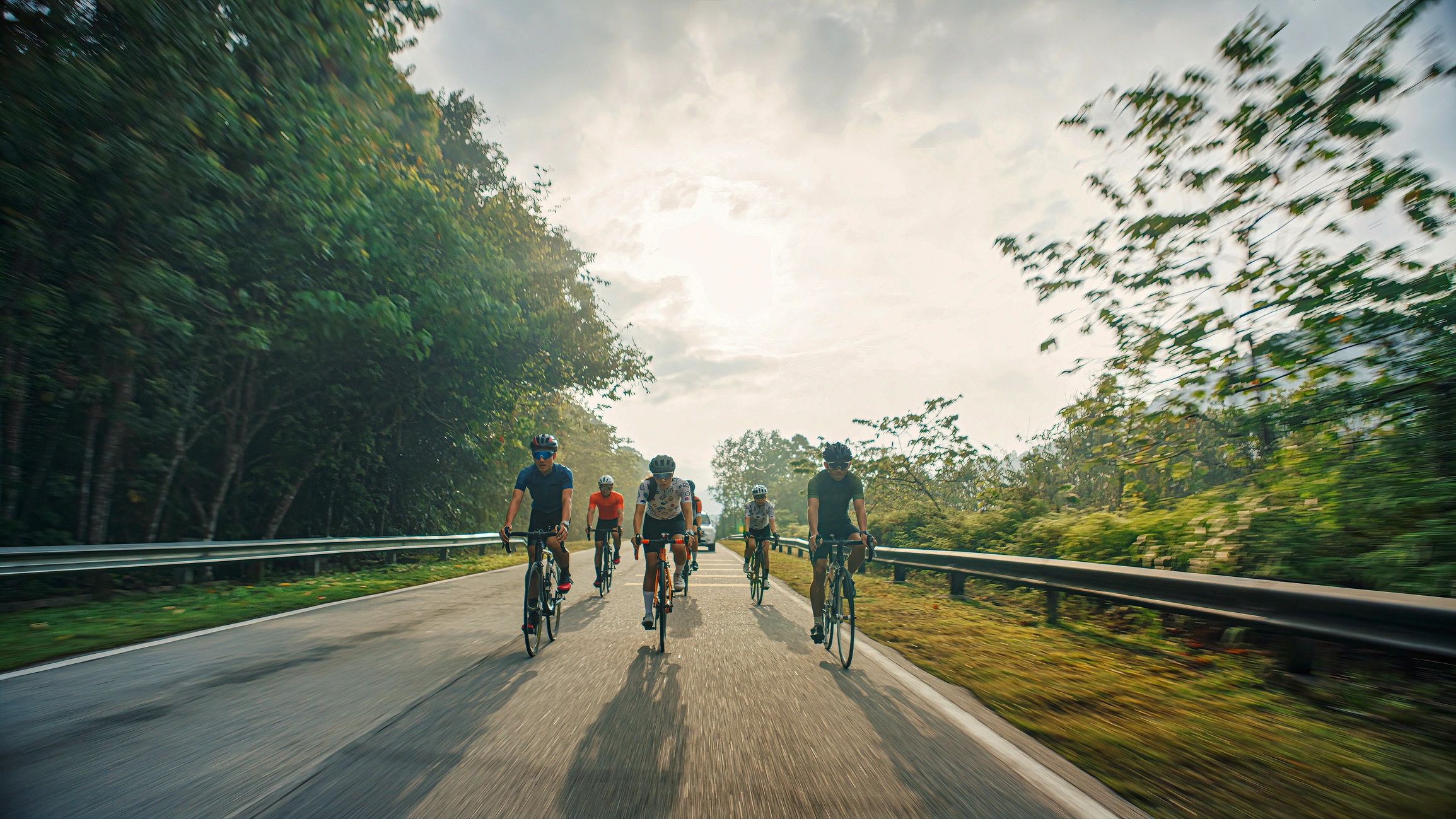 Cyclists training together on a rural road