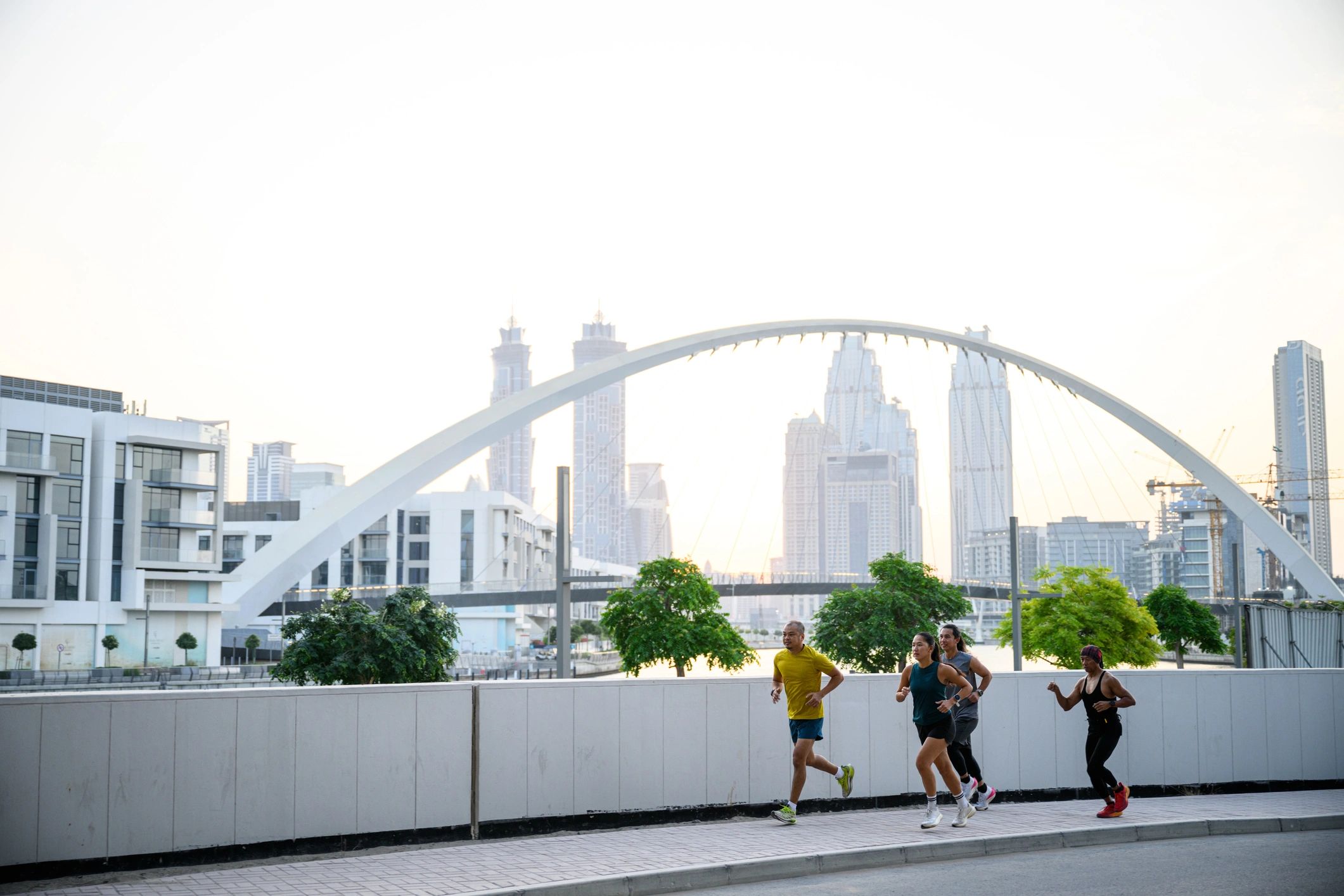 Group of runners training at sunrise