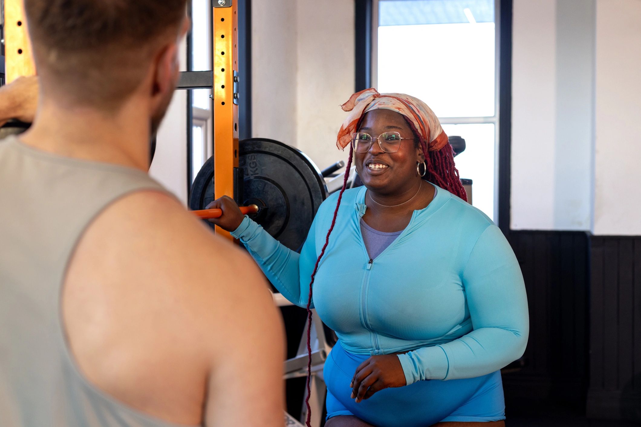 Coach and athlete reviewing training progress together